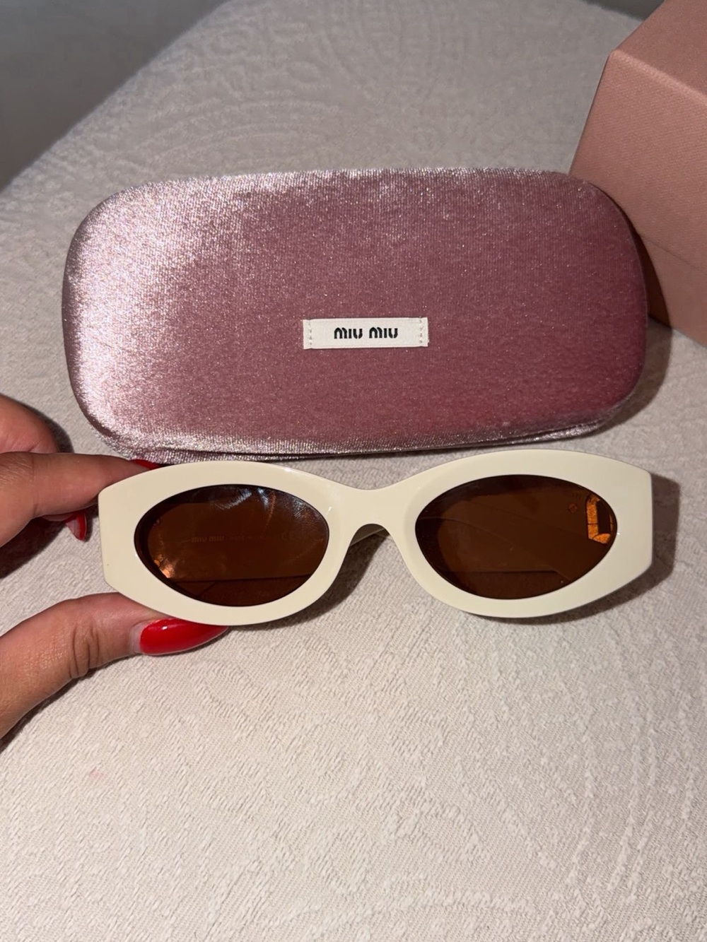Miu Miu Cream Oval Sunglasses with Brown Lenses